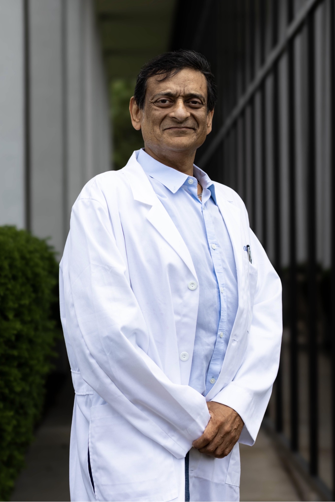 Dr. Abhinav Singla, MD in white coat